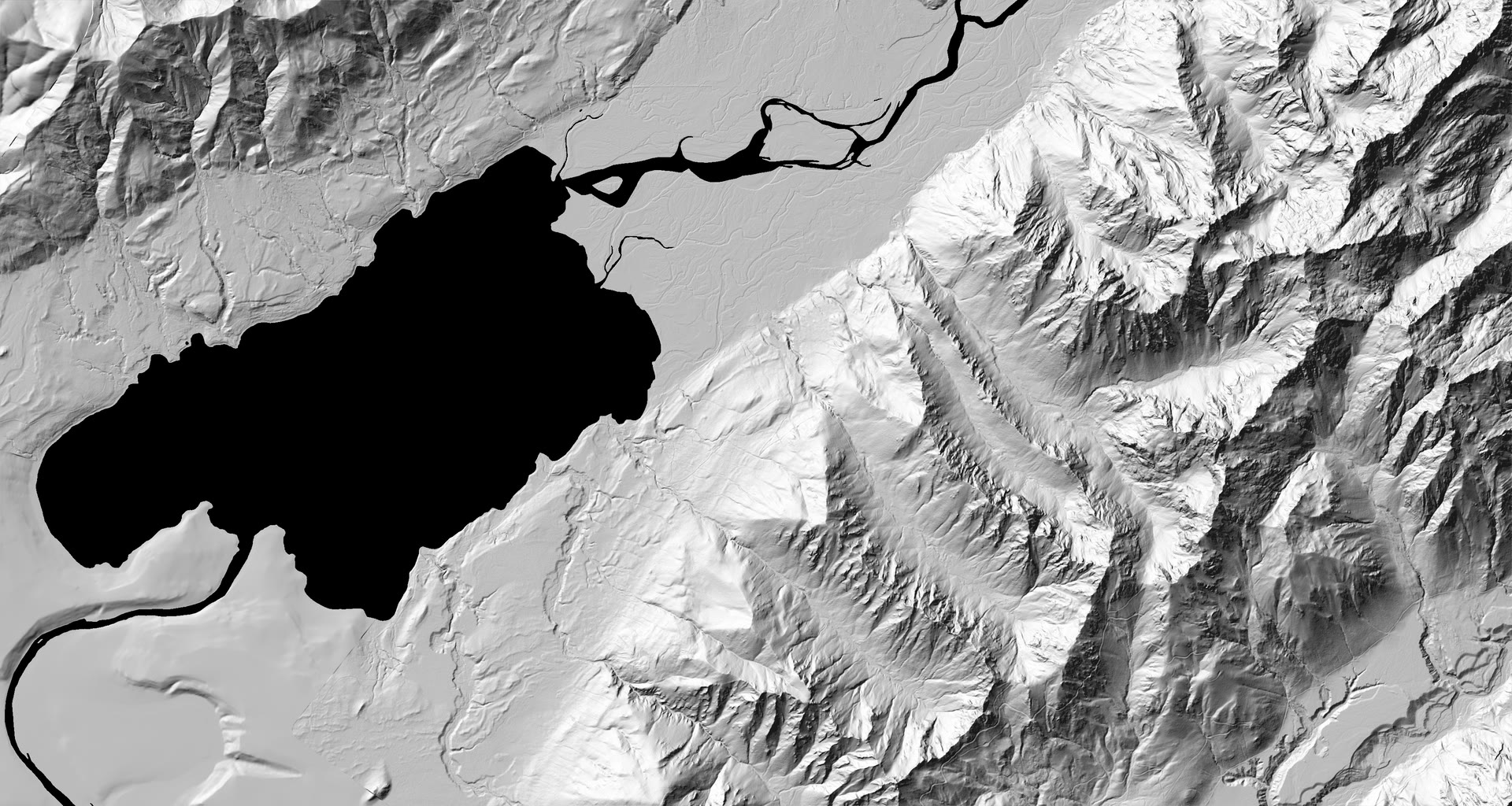 Grey shaded relief of the Quinault valley, north up: Lake Quinault in black, the river entering from the north-east and leaving to the south-west, steep ridges to the east. Numbered marks on the south-east shore show where each frame was taken, with the direction it looks.